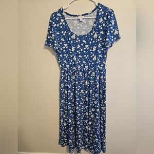 Blue maxi dress with sunflowers.